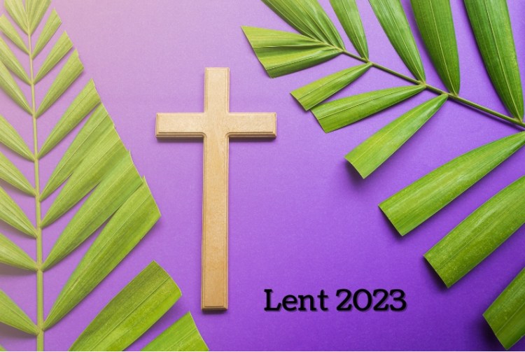 Palms and a wooden cross, with the text "Lent 2023"